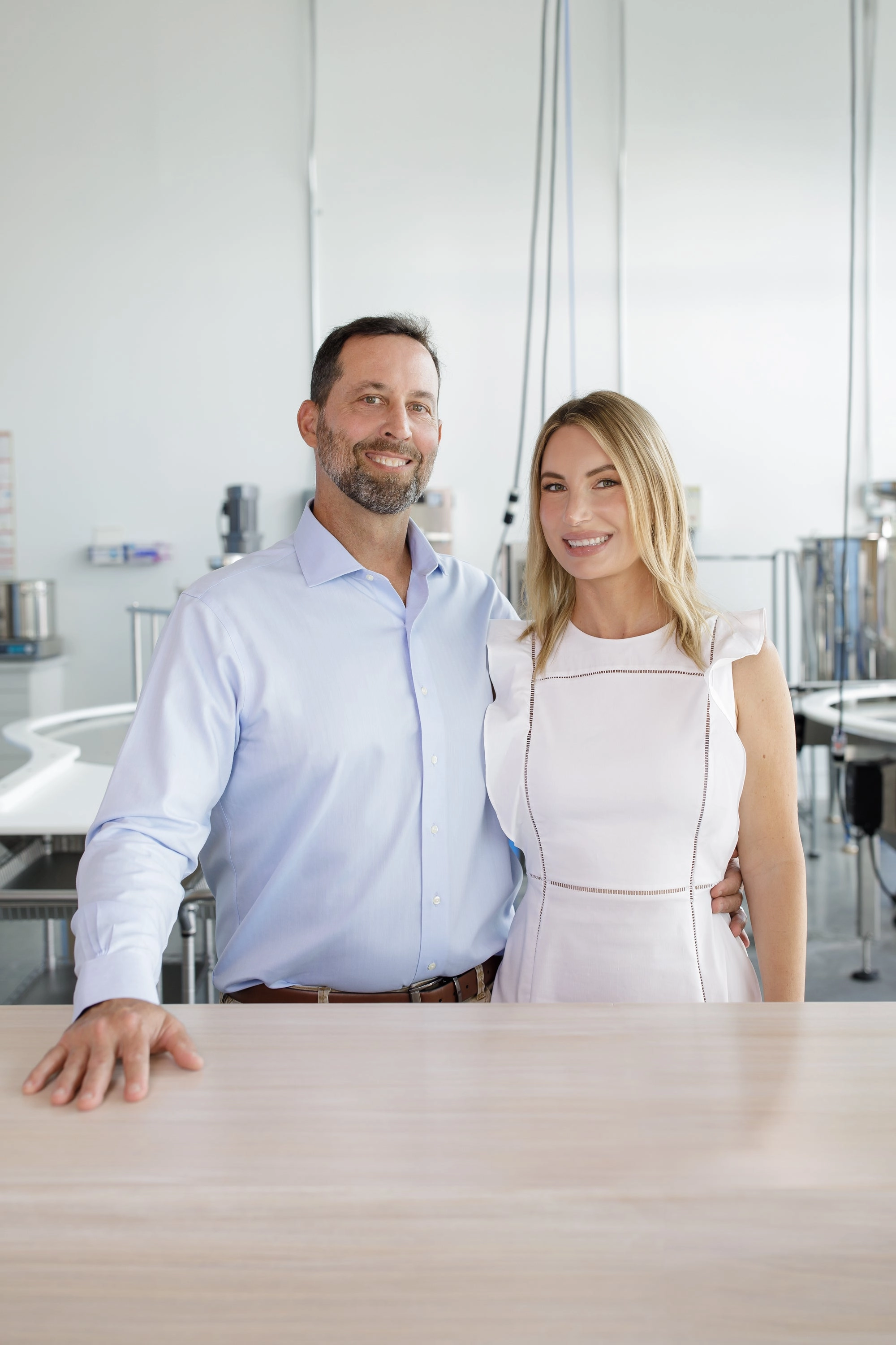 Skin at Peace co-founders Rodrigo and Lindsey Garcia in the lab.